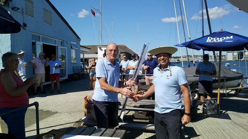 Peter Lye winner of the raffle during the Torpoint Mosquito Solo Open photo copyright Richard Woods taken at Torpoint Mosquito Sailing Club and featuring the Solo class