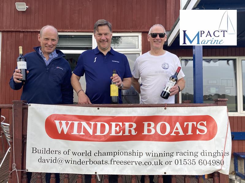 Budworth Solo Open winners (l-r) Philip Barnes 4th, Martin Honnor 1st, Innes Armstrong 2nd - Steve Denison 3rd had rushed home to watch the dancing ;-) photo copyright Justine Davenport taken at Budworth Sailing Club and featuring the Solo class