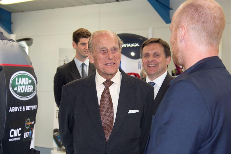 HRH The Duke of Edinburgh talks to staff at the Spinlock factory during his visit to Cowes, Isle of Wight photo copyright Francis Pike taken at  and featuring the  class
