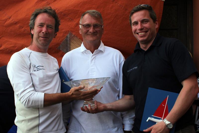 Colm Dunne and Rob Gill  win the Squib South Coast Championships at Glandore Harbour (Commodore John Dowling in the centre) photo copyright Mary Casey taken at Glandore Harbour Yacht Club and featuring the Squib class