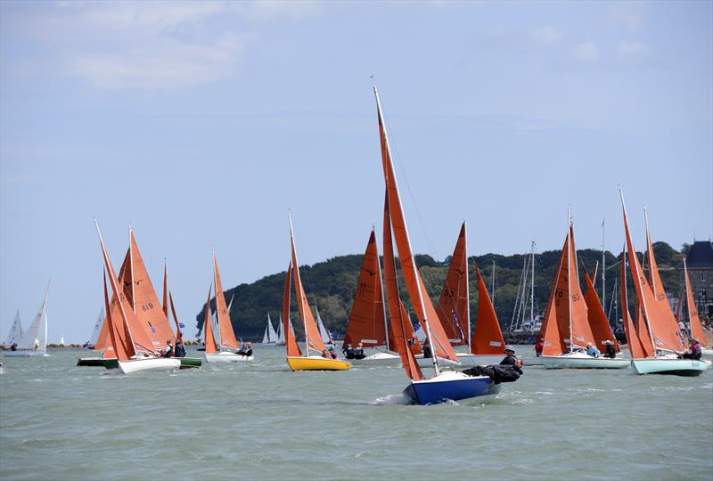 Malcolm Hutchings and Andy Ramsey lead the fleet in 'Lady Penelope' at Aberdeen Asset Management Cowes Week photo copyright Rick Tomlinson / CWL taken at Cowes Combined Clubs and featuring the Squib class