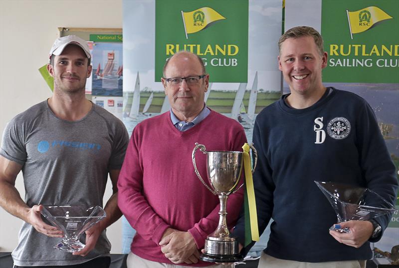Josh Metcalfe (left) and Mark Hogan (right) are presented with the Squib Inlands Trophy by Rutland Squib Captain Peter Dale (centre) photo copyright RSC taken at Rutland Sailing Club and featuring the Squib class