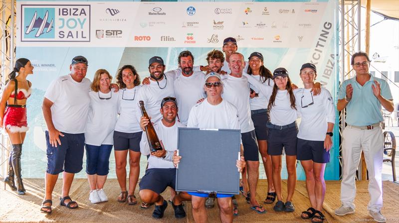 Ibiza JoySail Day 4: The crew of the Dark Horse, champion in Performance Cruising photo copyright Nico Martínez taken at  and featuring the Superyacht class