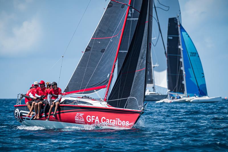 Overall winners of the 2023 St. Maarten Heineken Regatta, GFA Caraibes - La Morrigane - returned with a surprise: another fellow Surprise 25 from Martinique to heat up the competition photo copyright Laurens Morel taken at Sint Maarten Yacht Club and featuring the Surprise class