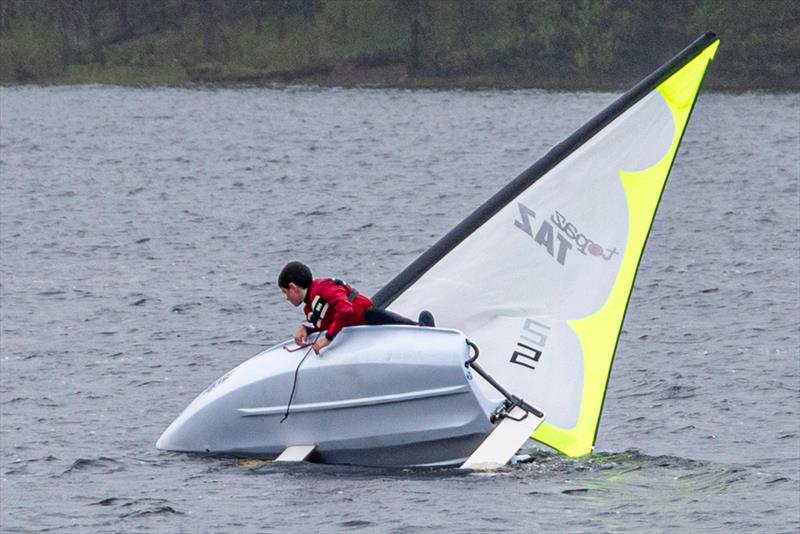 Over the Top - young Thomas stays dry during the King Charles III Cup at Merthyr Tydfil Sailing Club photo copyright Alan Cridge taken at Merthyr Tydfil Sailing Club and featuring the Topaz Taz class