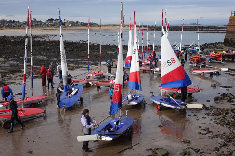 Toppers preparing to launch from the beach beside the Harbour, North Berwick during the Topper Academy weekend at East Lothian photo copyright Derek Braid taken at East Lothian Yacht Club and featuring the Topper class