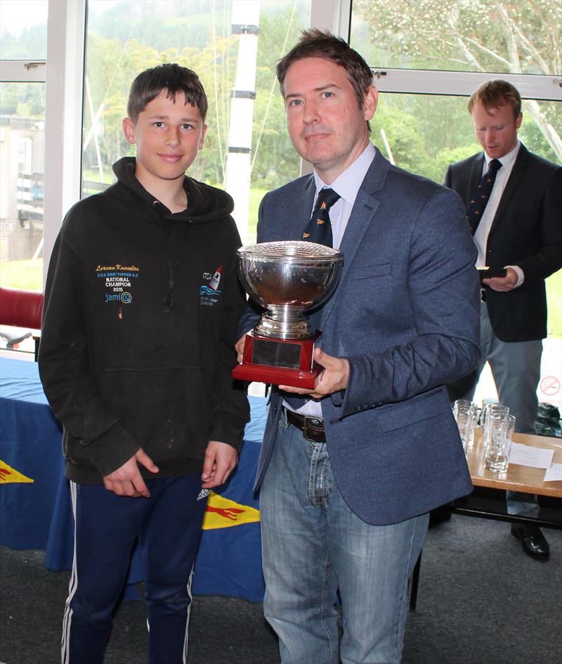 Commodore Robin Dawson presents the Topper trophy to Lorcan Knowles during the North West Junior Travellers at Bassenthwaite photo copyright William Carruthers taken at Bassenthwaite Sailing Club and featuring the Topper class