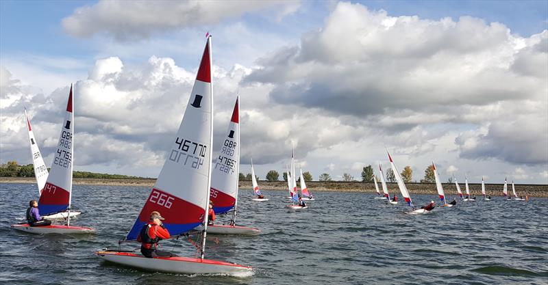 Will Thomas, David Peaty, Eve Bhogal chasing down the leaders during the Topper Midlands Traveller Draycote photo copyright Midlands Topper Fleet taken at Draycote Water Sailing Club and featuring the Topper class