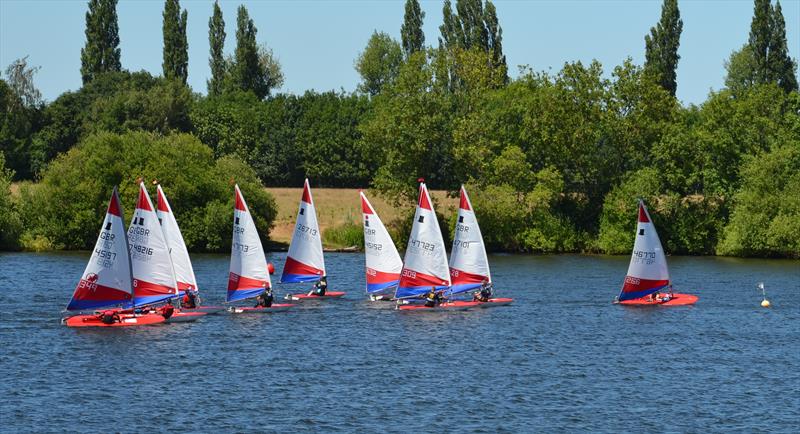 Will Thomas shows the fleet how to start during Topper Midlands Traveller Round 4 at Swarkestone photo copyright Victoria Turnbull taken at Swarkestone Sailing Club and featuring the Topper class