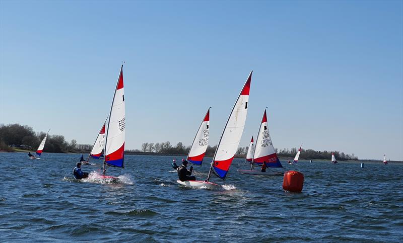 Close battle at the windward mark in shifty conditions during the ITCA Midlands Topper Traveller Series 2021-22 at Draycote Water photo copyright Jon Hughes taken at Draycote Water Sailing Club and featuring the Topper class