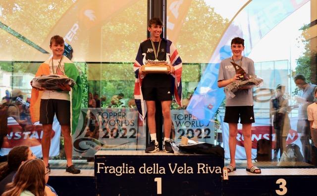 5.3 podium in the Topper Worlds 2022 at Lake Garda photo copyright James Harle, Alex Dean, Mauro Melandri taken at Fraglia Vela Riva and featuring the Topper class