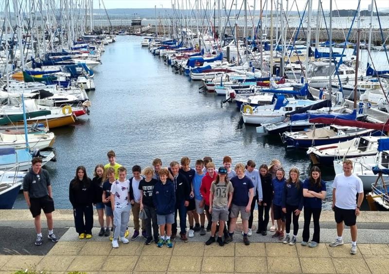 Very happy (and tired) Sailors/Coaches at the end of the ITCA (GBR) Invitation Coaching at Poole photo copyright Karen Edwards taken at Poole Yacht Club and featuring the Topper class