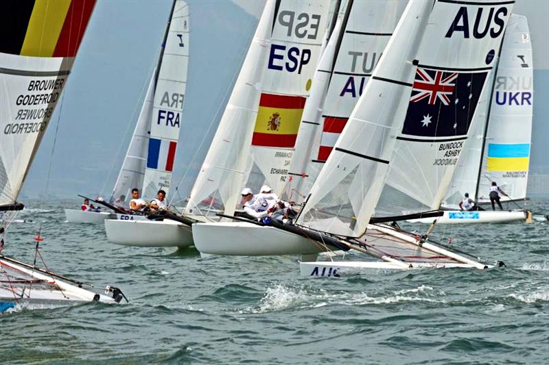 Tornados coming off the start line - Qingdao Olympic Regatta 2008 photo copyright Richard Gladwell taken at  and featuring the Tornado class