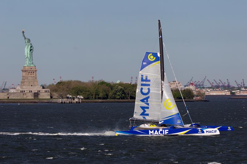 François Gabart and the Ultime trimaran Macif depart New York photo copyright Alexis Courcoux taken at  and featuring the Trimaran class