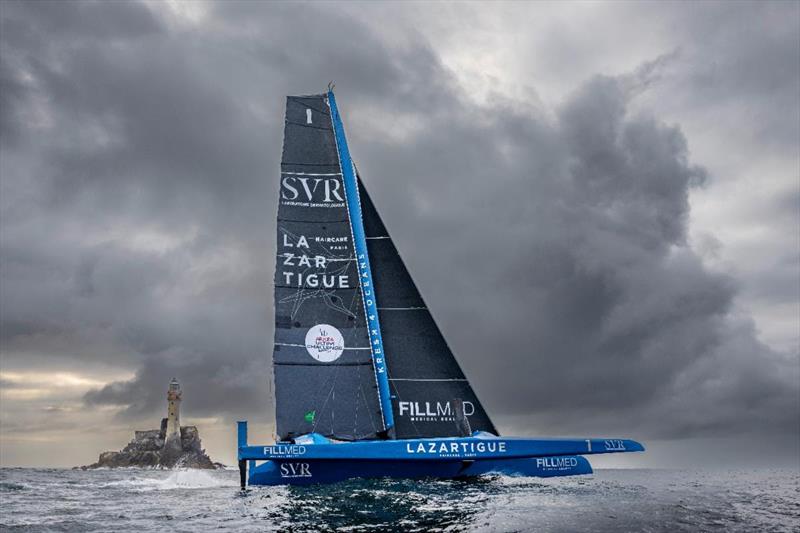 First home to Cherbourg-en-Cotentin was the François Gabart-skippered 32m Ultim trimaran SVR Lazartigue in a new record time of  1 day 8 hours 38 minutes 27 seconds; 58 minutes 16 seconds photo copyright Rolex / Carlo Borlenghi taken at Royal Ocean Racing Club and featuring the Trimaran class