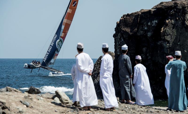 Local Omani's look on to the Land Rover Extreme 40 sailing in Oman on day 1 of Extreme Sailing Series Act 2 - photo © Lloyd Images