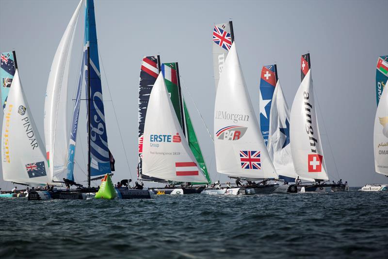 The fleet race downwind in what was a tactically challenging penultimate day in Muscat at Extreme Sailing Series Act 2 - photo © Lloyd Images