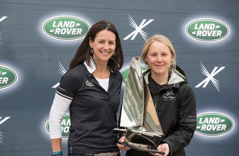 Sarah Ayton receives the Land Rover 'Above and Beyond' from Global Brand Ambassador Hannah White, for inspiring the next generation of young aspiring sailors - photo © Lloyd Images