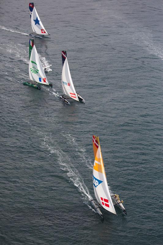 The pack chase SAP Extreme Sailing Team as they sail downwind during the Bosphorus race on day 3 of Act 6, Istanbul photo copyright Lloyd Images taken at  and featuring the Extreme 40 class