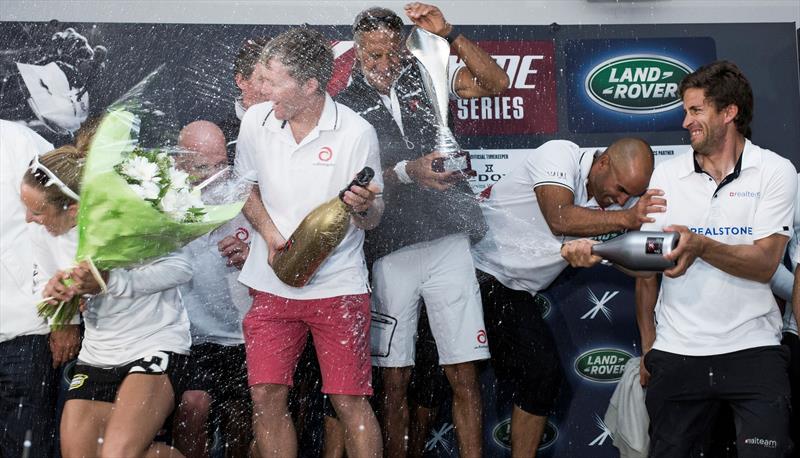 Realteam's Jerome Clerc sprays Champagne over the winners Alinghi in Extreme Sailing Series Act 7, Nice photo copyright Lloyd Images taken at  and featuring the Extreme 40 class