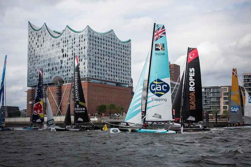 The fleet race in front of the Elbphilharmonie on day 1 of Extreme Sailing Series Act 5, Hamburg photo copyright Jesus Renedo / OC Sport taken at  and featuring the Extreme 40 class