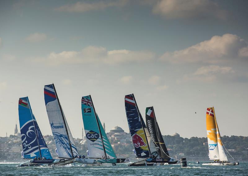 The fleet charge the startline on day 3 of Extreme Sailing Series Act 7, Istanbul photo copyright Lloyd Images taken at  and featuring the Extreme 40 class