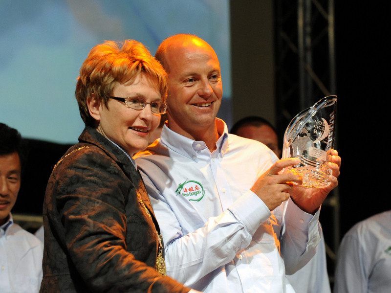 Executive Mayor of Cape Town Helen Zille presents Green Dragon skipper Ian Walker from the UK with the Waterford Trophy for third place during the Volvo Ocean Race Leg 1 Prize Giving photo copyright Rick Tomlinson / Volvo Ocean Race taken at  and featuring the Volvo 70 class