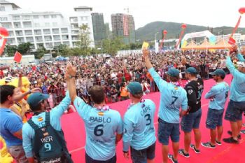 Team Telefonica, skippered by Iker Martinez from Spain celebrate on stage as they finish first on leg 3 of the Volvo Ocean Race