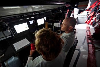 Tom Addis and Ken Read mull over the new weather information in hopes of finding a way out of the northwest predicaments to come during leg 4 of the Volvo Ocean Race