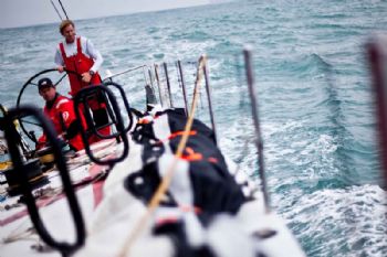 Ken Read navigates a lumpy seaway before leaving sight of land in the South China Sea during leg 4 of the Volvo Ocean Race