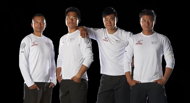 Dongfeng Race Team's four Chinese crew photo copyright Yvan Zedda / Dongfeng Race Team taken at  and featuring the Volvo 70 class