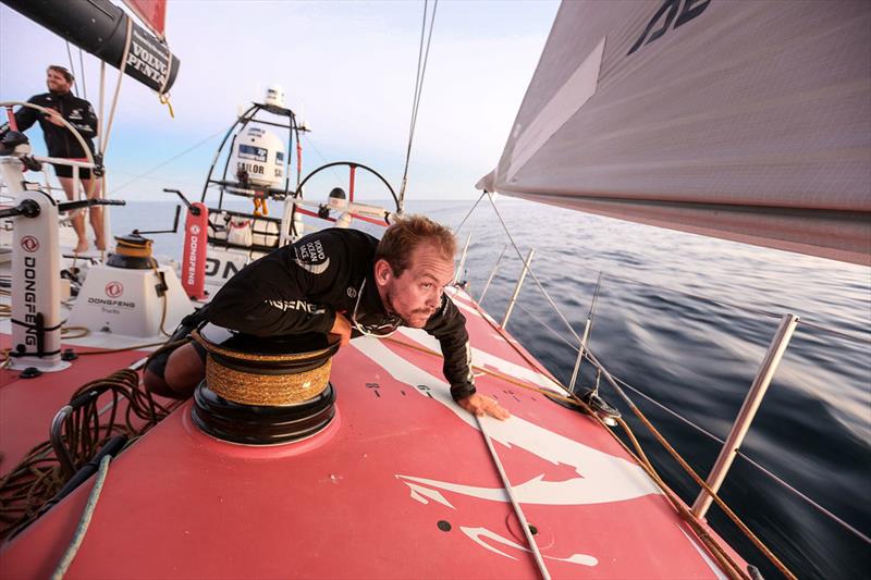 Leg 2, Day 22 - Kevin Escoffier on Dongfeng Race Team checks for a sight of Team Brunel photo copyright Yann Riou / Dongfeng Race Team taken at  and featuring the Volvo One-Design class