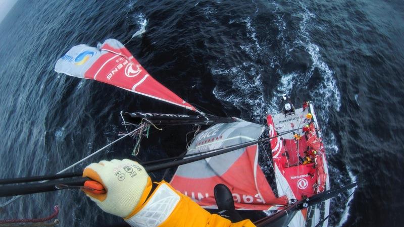 Dongfeng Race Team cut away a sail from their broken mast during Volvo Ocean Race Leg 5 photo copyright Yann Riou / Dongfeng Race Team / Volvo Ocean Race taken at  and featuring the Volvo One-Design class