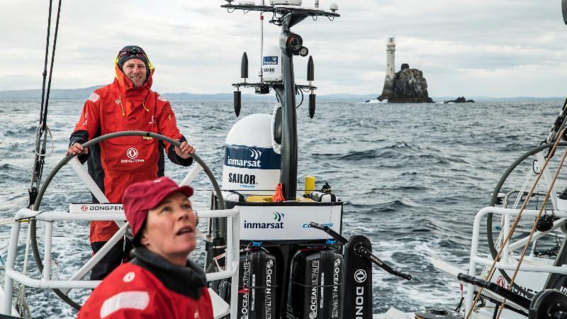 Dongfeng Race Team's VO65 round the Fastnet Rock in the Rolex Fastnet Race photo copyright Jeremie Lecaudey / Volvo Ocean Race taken at Royal Ocean Racing Club and featuring the Volvo One-Design class