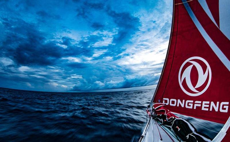 Sunset showers on board Dongfeng during Volvo Ocean Race Leg 2: Lisbon to Cape Town photo copyright Jeremie Lecaudey / Volvo Ocean Race taken at  and featuring the Volvo One-Design class