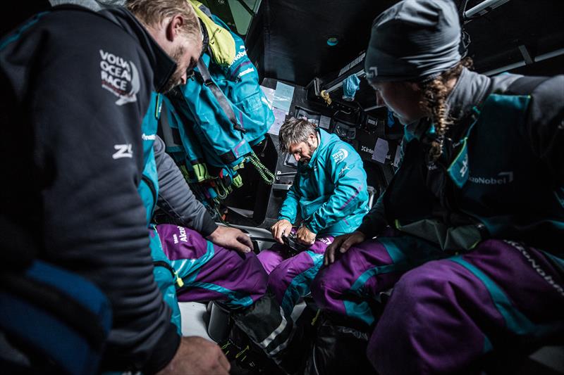 On board AkzoNobel Brad Farrand and Emily Nagel watch skipper Simeon Tienpont getting hands on with repairs during Volvo Ocean Race leg 2 photo copyright James Blake / Volvo Ocean Race taken at  and featuring the Volvo One-Design class