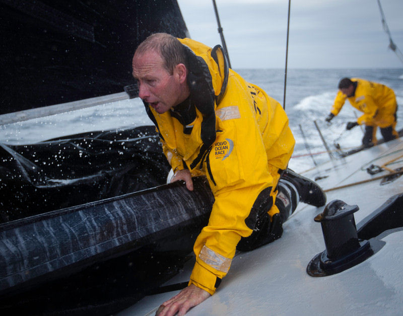 Craig Satterthwaite from New Zealand stacking sails onboard Abu Dhabi Ocean Racing during leg 4 of the Volvo Ocean Race