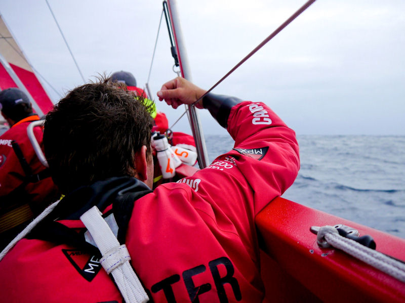 Mike Pammenter looking at upcoming clouds onboard CAMPER with Emirates Team New Zealand during leg 4 of the Volvo Ocean Race