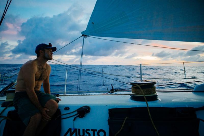 Volvo Ocean Race Leg 4, Melbourne to Hong Kong, day 12, Nick Dana trims the masthead code zero sail to leeward during sunset on board Vestas 11th Hour photo copyright Amory Ross / Volvo Ocean Race taken at  and featuring the Volvo One-Design class