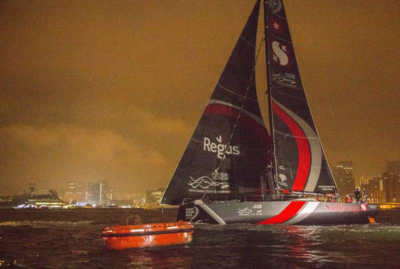 VOR 2017-18 leg 4 finish in Hong Kong. SHK Scallywag crosses the line between Kai Tak Runway Park (background) and the ODM (foreground) photo copyright Guy Nowell taken at  and featuring the Volvo One-Design class