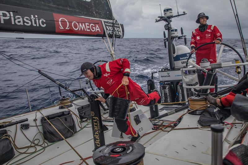 Leg 6 to Auckland, day 17 on board Sun hung Kai / Scallywag. Trystan Seal cleaning the boat. 23 February,  photo copyright Jeremie Lecaudey / Volvo Ocean Race taken at  and featuring the Volvo One-Design class