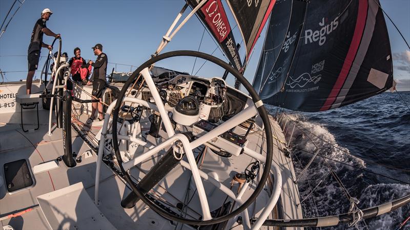 Leg 6 to Auckland, day 18 on board Sun hung Kai / Scallywag. John Fisher at the helm while Marcus and Antonio enjoy the last rays of sun. 25 February,  photo copyright Jeremie Lecaudey / Volvo Ocean Race taken at  and featuring the Volvo One-Design class