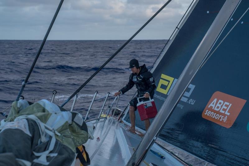 Volvo Ocean Race  Leg 6 to Auckland, day 19 on board Brunel. Dishwashing at the bow for bowman Carlo Huisman. 25 February - photo © Yann Riou / Volvo Ocean Race