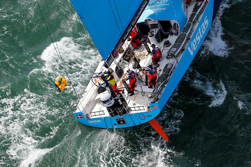 All Blacks rugby legend, Keven Mealamu, jumps from the back of Vestas 11th Hour Racing after the inshore portion of the leg start in Auckland -  Volvo Ocean Race Leg 7, Auckland to Itajai photo copyright Ainhoa Sanchez / Volvo Ocean Race taken at  and featuring the Volvo One-Design class