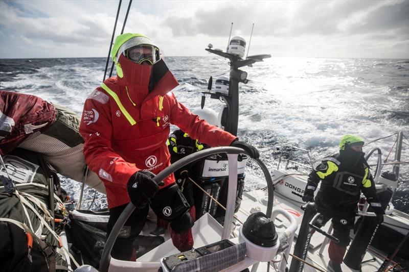 Leg 7 from Auckland to Itajai, day 07 on board Dongfeng. Jeremie eyou helming in a cold weather photo copyright Martin Keruzore / Volvo Ocean Race taken at  and featuring the Volvo One-Design class