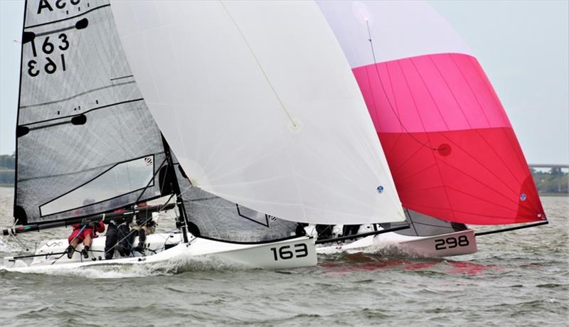 VX One entries Magic 8 Ball (bow number 163) and Rosebud (298) sail downind neck-and-neck on Sunday - 2021 Charleston Race Week photo copyright Willy Keyworth taken at Charleston Yacht Club and featuring the VX One class