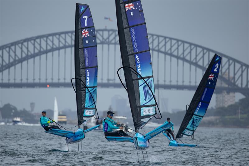 Young sailors take part in the Inspire Racing x WASZP program sail past the Sydney Harbour Bridge on Race Day 2 of the KPMG Australia Sail Grand Prix in Sydney, Australia. Saturday 19th February 2023 photo copyright Chloe Knott for SailGP taken at  and featuring the WASZP class