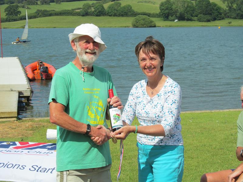 Hollowell's Commodore Nicola Wilkinson making a presentation to Mike Playle during the Seavets Windsurfing Open at Hollowell photo copyright Robin Buxton taken at Hollowell Sailing Club and featuring the Windsurfing class