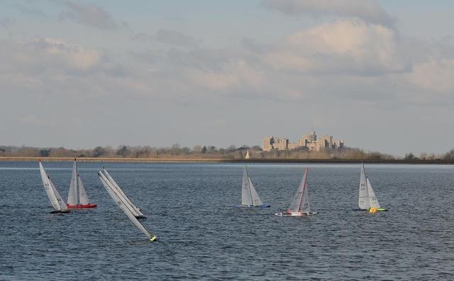 The fleet, led by Graham Bantock, rounding the windward mark in front of Windsor Castle photo copyright David Adam taken at Datchet Water Radio Sailing Club and featuring the 10 Rater class