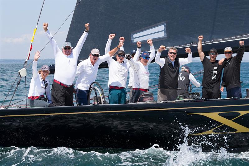 Challenge XII (KA-10) owner/helmsman Jack LeFort (second from left) celebrates victory and a World Championship title after today's final race of the 2019 12 Metre World Championship photo copyright Ian Roman taken at Ida Lewis Yacht Club and featuring the 12m class